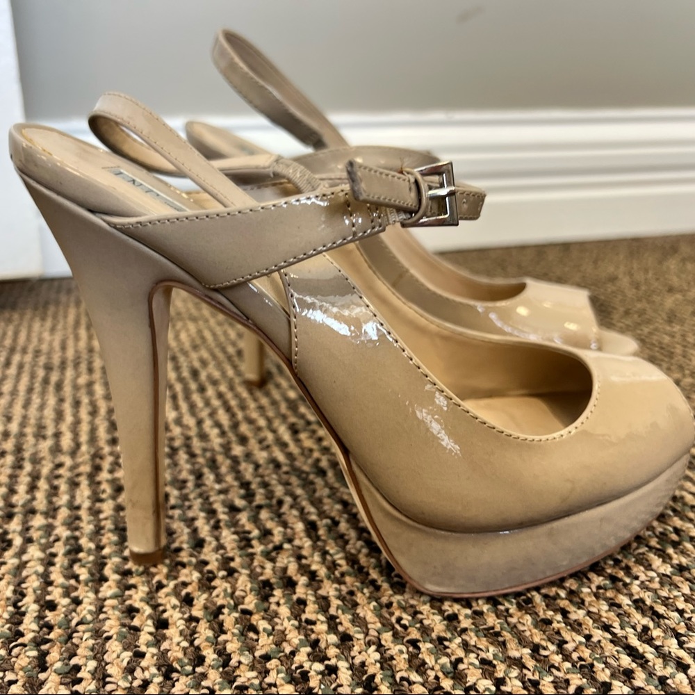Nude color peep toe heels; worn 2 times